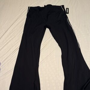 Fashion Nova Black wide Bottoms with White Stripes